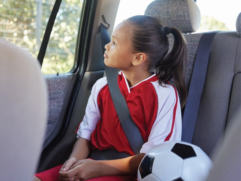 Child looking out the car window