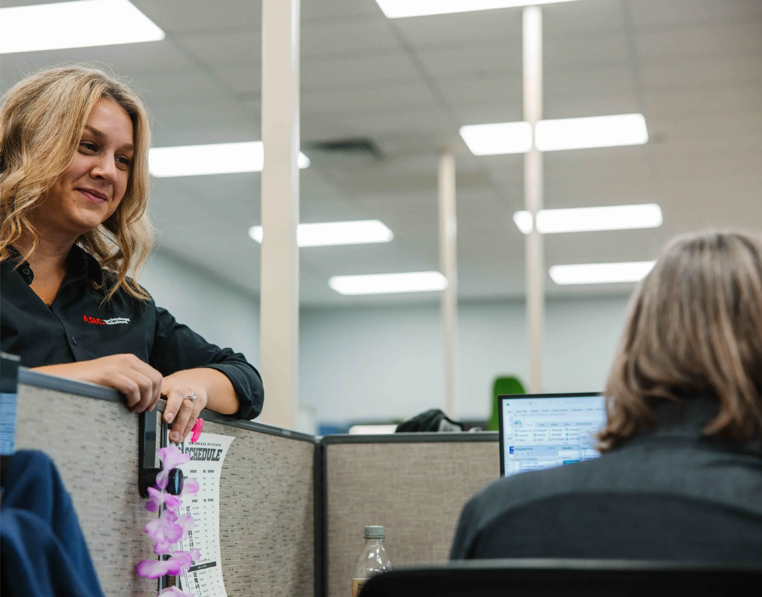 people talking in office environment