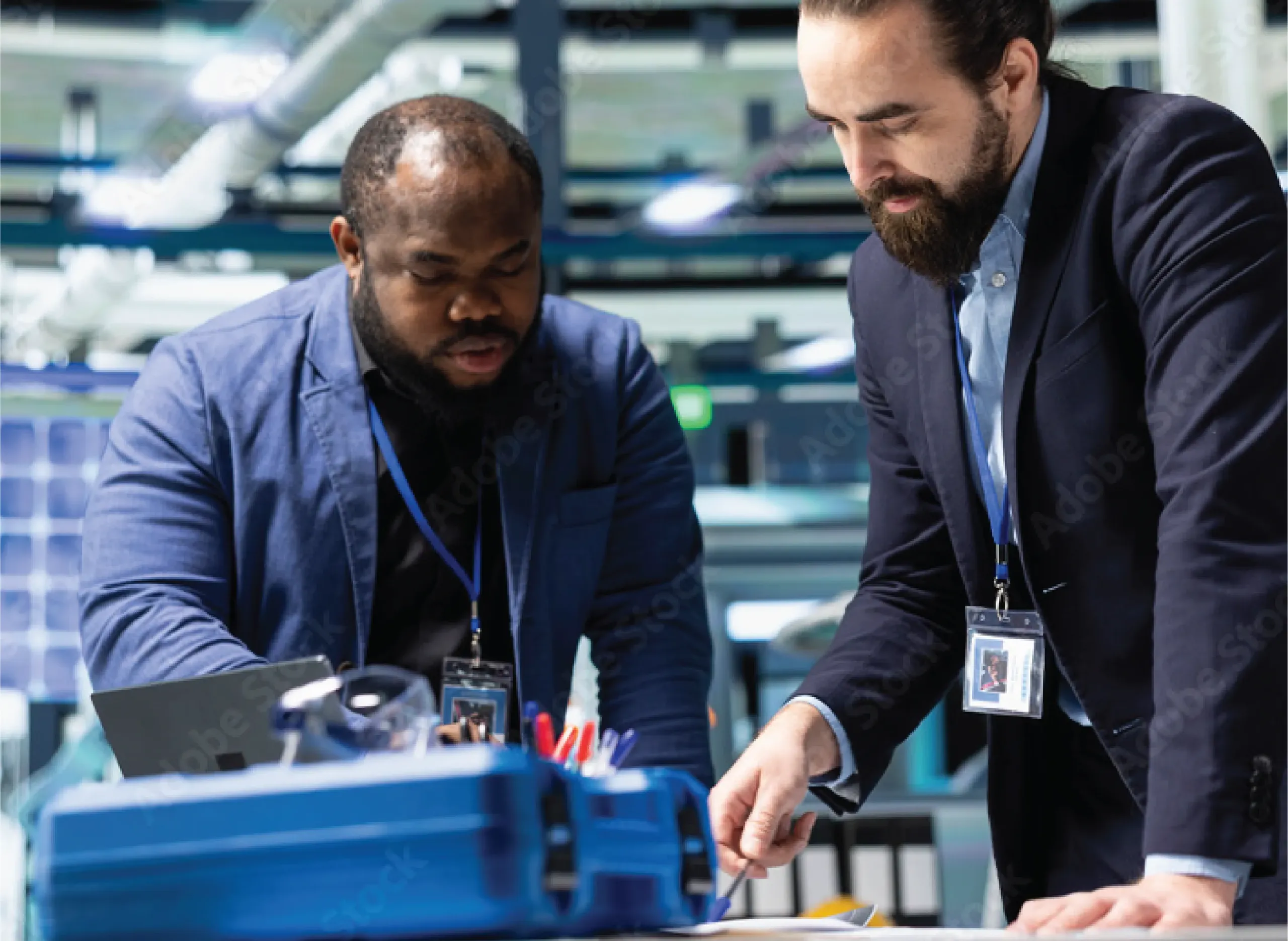 two men working on a solution